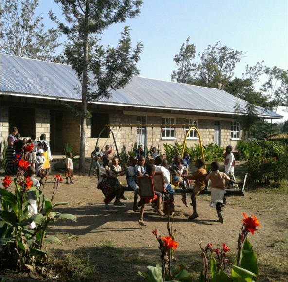 Arise School building and students